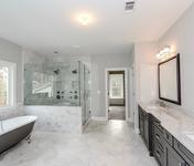 Carrara Marble Floors and Tile in this luxurious Master Bath built by Waterford Homes in Brookhaven, GA